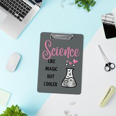 a clipboard with the words science like magic but cooler on it next to a laptop