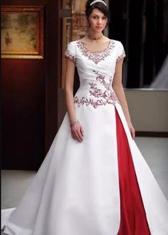 a woman in a white and red wedding dress