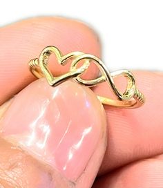 Interlocking heart and infinity ring, the bond is real, the love is forever. Made from 92.5 sterling silver metal. Gold color is 14K vermeil Cute Gold Rings Simple, Infinity Gold Ring, Void State, Girls Rings, Evil Eye Ring Gold, Daughter Ring, Delicate Gold Bracelet, Friendship Ring, Gold Rings Simple