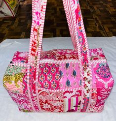 Cotton Quilted  block print multi patch weekend bags  100% cotton fabric SIZE:  medium : 16" x 8" x 8 " large : 18" x 9" x 9 Big Size :20" x 10" x 10"  the bags feature two pockets each on the outside   :Color : Same as pictures  : Quilted Padding   great for weekend getaways, beach trips and as carry on bags while travelling Ask me for custom orders, personalized pouches or wholesale  CARE: Machine wash separately in cold water Pink Fabric Rectangular Bag, Bohemian Pink Cotton Shoulder Bag, Bohemian Pink Cotton Bags, Pink Bohemian Cotton Shoulder Bag, Pink Bohemian Cotton Bags, Pink Fabric Rectangular Shoulder Bag, Pink Rectangular Fabric Shoulder Bag, Rectangular Pink Fabric Shoulder Bag, Multicolor Cotton Patchwork Bags