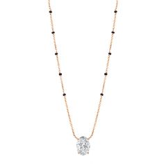 Discover the Deepika Mangalsutra, where timeless tradition meets modern sophistication. This elegant necklace features a vertically set brilliant oval certified lab-grown diamond in a fixed pendant, with options ranging in diamond size and grade. Crafted from luxurious 18k gold—available in yellow, white, or rose—it is accented with five evenly spaced black beads on each side of the chain and a diamond ranging in size and grade. The Deepika Mangalsutra transcends mere adornment; it's an embodime Deepika Mangalsutra, 18k Gold Chain, Elegant Necklace, Elegant Necklaces, Diamond Sizes, Lab Diamonds, Black Beads, 18k Rose Gold, Gold Chain