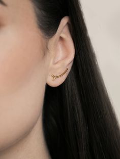 Inspired by a simplicity of a tree twig, this earring organically follows your earlobe and defines your style. Its minimalist and unique design gives you a feeling of lightness, distinctiveness and beauty. You'll fall in love with it from the very first time you wear it! No unnecessary details, just pure subtlety. On top of that, it's really comfortable to wear. A 0.8 mm wire at the back holds your earring securely in place, so you'll even forget you're wearing it. You can choose a bare sterling Super Short Pixie, Gold Ear Climbers, Silver Ear Climbers, Ear Climber, Ear Pins, Minimal Earrings, Ear Climbers, Short Pixie Haircuts, Gold Bar