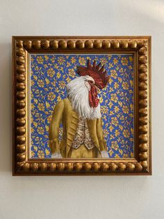 a painting on the wall of a building with a rooster in it's head