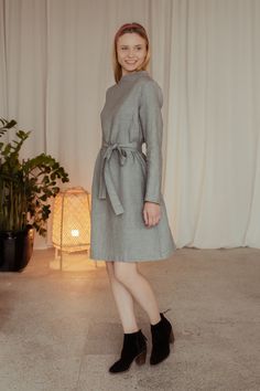 "Linen wool blend dress - is the common of pure simplicity and the elegant look - created specially for you. Very comfortable for casual wear. Just simple trapeze shape, long sleeves and a bit higher and wider neck makes this dress simply chic and elegant. The dress fitted at shoulders, but loose and comfortable for wearing. You can wear it with long separate belt or without You will look stunning and attractive with this dress on any important occasion, events or in the office. DRESS DETAILS: - Linen Dresses Elegant, Petite Dresses Casual, Minimalist Dress, Dress High Neck, Petite Dress, Long Sleeve Dress Formal, Office Dress, Minimalist Dresses, Dress Fitted