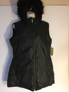 Template By Froo! MICHAEL KORS WOMEN SLEEVELESS DOWN JACKET W/FAUX FUR HOOD-SIZE M-REVERSIBLE NEW WITH TAGS MICHAEL KORS WOMEN SLEEVELESS DOWN JACKET W/FAUX FUR HOOD-SIZE M-NWT $150.00 REVERSIBLE- ONE SIDE SHINY SNAKE SKIN LOOK-OTHER SIDE SOLID MEASUREMENT WHEN LAID FLAT:  SHOULDER:  16" CHEST: 21" LENGTH: 28" NO SLEEVES After winning a bid or buying now, please note that if no payment is received within 2 days an unpaid item case is automatically opened. Thank you!  I return all feedback. Leave Hooded Vest Outerwear For Cold Weather, Fitted Michael Kors Casual Outerwear, Fur Hood, Negative Feedback, Canada Goose Jackets, Down Jacket, Snake Skin, Vest Jacket, Faux Fur