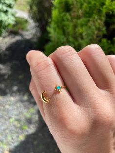 Adjustable Moon Ring -  Celestial Ring - Moon and Star Ring - Crescent Moon Ring   ☁️ ☁️⋅♡𓂃 ࣪ ִֶָ☾. 💗 ☁️ Beautiful ring featuring a crescent moon   ☁️ Ring is adjustable to fit a variety of finger sizes  ❤︎ *Allergy Disclaimer: For those allergic or who tend to experience skin sensitivity to metal, nickel, etc. please be advised that products contain metal and are not considered hypoallergenic. ❤︎ *Safety disclaimer ♡  This product contains small pieces, which could pose a choking hazard for s Adjustable Celestial Crystal Open Ring, Celestial Open Crystal Ring Gift, Celestial Open Crystal Ring For Gift, Celestial Open Ring With Moon Charm, Celestial Style Open Ring With Moon Charm, Celestial Crescent Crystal Ring Gift, Adjustable Celestial Midi Rings, Adjustable Moon Shaped Celestial Midi Rings, Handmade Celestial Crystal Ring For Promise