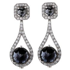 2 Black Diamonds Weighing 13.37 Carats Suspended from 2 Black Diamonds Weighing 11.56 Carats Surrounded by 1.81 Carats of Round Brilliant Cut Diamonds - Total Diamond Weight is 26.74 Carats. Colored Diamond Jewelry, Black Diamond Jewelry, Black Diamond Earrings, Black Diamonds, Black Jewelry, Earrings Black, Black Earrings, Round Earrings, Round Brilliant Cut Diamond