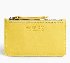 Organize credit cards, cash, and ID with this lined leather wallet featuring RFID protection and a secure zip closure. From American Leather Co. Travel Bifold Card Holder With Zipper Pouch, Yellow Travel Coin Purse With Card Slots, Travel-friendly Yellow Coin Purse With Card Slots, Leather Bifold Wallet With Zipper Pouch, Leather Travel Wallets With Zipper Pouch, Yellow Leather Travel Wallets, Leather Coin Purse With Card Slots For Travel, Modern Leather Wallet With Zipper Pouch, Modern Bifold Wallet With Zipper Pouch