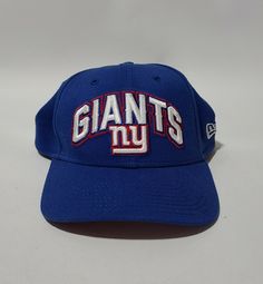 New York Giants NFL New Era Blue Flex Baseball Cap Hat Mens Small - Medium. Vintage Blue Snapback Baseball Cap, Vintage Blue Snapback Fitted Hat, Vintage Blue Snapback Cap, Vintage Blue Adjustable Fitted Hat, Vintage Blue Sports Hat, Blue Adjustable Hat For Fan Gear, Vintage Blue Baseball Cap With Curved Bill, Vintage Blue Baseball Cap For Sports, Blue Fitted Hat For Sports Events