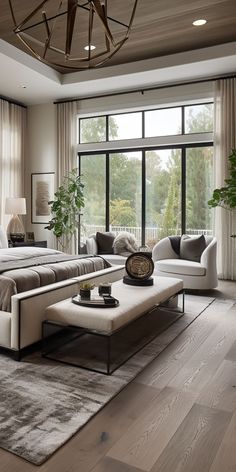 a living room filled with furniture and a large window