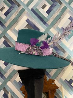 "Lavender faux leather tooled hat band with accent yarn around the edges and slider with feathers.  Large feather is hand painted with Swarovski's .  Band is 23\" and ties in the back to be adjustable for different hat sized.  Hat in picture is small Charlie One Horse felt Hatband is 22.5\" wide and 1.5\" wide Find more bands at Melsbandcandy.com" Large Feathers, Different Hats, Leather Hat, Felt Fedora, Leather Hats, Hat Band, Leather Tooling, Hat Sizes, Sliders