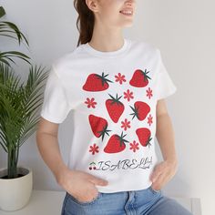 About our Custom T-shirt Aesthetic Flower Top * Witchy Nature Lover Gift * T-Shirt * Goblincore * Cottagecore T-Shirt 🍓 **Personalized Fruit T-shirts - Take the freshness with you - **Unique Designs Each t-shirt is adorned with vibrant, detailed illustrations of your favorite fruits: juicy strawberries, tropical pineapples, refreshing lemons and more. - **Premium Quality Made with soft and durable cotton, our t-shirts ensure all-day comfort and resistance to multiple washes. - **Exclusive Personalization Do you have a favorite fruit or a specific design in mind? We make it happen! Personalize your t-shirt with names, dates or special phrases. - **Perfect Gift Ideal for fruit and fashion lovers. Surprise your friends and family with a unique, personalized gift that is sure to stand out. - Cotton T-shirt With Strawberry Print, Cotton Short Sleeve T-shirt With Strawberry Print, White Short Sleeve Tops With Strawberry Print, Casual Red T-shirt With Funny Print, Casual White Tops With Fruit Print, White Casual Top With Fruit Print, White Casual Fruit Print Top, White Relaxed Fit T-shirt With Strawberry Print, Trendy Red T-shirt With Strawberry Print