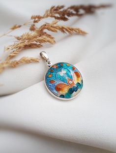 "Georgian cloisonne enamel pendant/Sterling silver jewelry/Colorful necklace/Hot enamel jewelry/Gift for her ... This pendant comes without chain!  ... Made to order... As you understand this pendant can't be absolutely similar to the one you see in the picture because its handmade. ... Handmade pendant with Georgian cloisonne enamel ... Used materials\" Sterling silver 999  Silver 925 Hot cloisonne enamel" Hand Painted Enamel Jewelry For Gifts, Hand Painted Enamel Jewelry Gift, Enamel Medallion Necklace For Gift, Multicolor Cabochon Round Pendant Jewelry, Turquoise Enamel Jewelry Gift, Multicolor Hallmarked Necklaces As Gift, Multicolor Hallmarked Necklace For Gift, Enamel Hallmarked Oval Pendant Necklace, Pendant Jewelry With Inlay As Gift