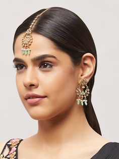 Beautiful kundan earrings with stones and pearls, plus matching mang tikka Traditional Indian Jewelry: Slight Color variations are possible due to lighting and photography. If you are interested in purchasing this item and have any additional questions about this item, please feel free to email us at nazranaanj@gmail.com. For faster responses, call us at 732-283-1808 or WhatsApp us at 609-852-9922 Care instructionsKeep Jewelry away from direct heat, water, perfumes, deodorants and other strong - Temple Jewelry Stone Work Danglers For Wedding, Temple Jewelry Style Danglers With Stone Work For Reception, Reception Temple Jewelry Danglers With Stone Work, Kundan Chandbali Necklace With Pearl Drop, Chandbali Kundan Necklace With Pearl Drop, Elegant Festive Pearl Drop Tikka, Kundan Meenakari Bridal Earrings For Reception, Elegant Kundan Jhumkas With Gota Work, Festive Kundan Jewelry With Pearl Drop