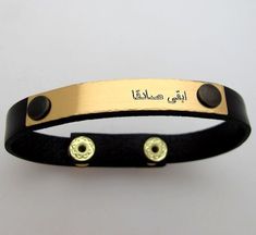 Personalized Arabic Engraved bracelet, Mens bracelets, Custom mens bracelet, Arabic Jewelry - Arabic Name Bracelet - Mens Jewelry Personalized Name Bracelet for men in Arabic language or any other language Hebrew, Chinese, Japanese, French, Spanish etc.. The cuff is made of genuine leather and high quality gold metal details. The focal point of the design is the engraved metal plate. The size of the bracelet is adjustable, so you don't need to worry about the size when order it. Order unique acc Bracelet Boyfriend, Leather Bracelet For Men, Arabic Jewelry, Mens Bracelets, Engraved Metal, Bracelet Mens, Jewelry Personalized, Arabic Language, Engraved Bracelet