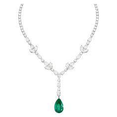 This magnificent necklace features an exquisite deep green emerald weighing 12 carat, delicately suspended from a line of pear cut, marquise and round white diamonds representing a lovely flower motif. The elegant proportion showcases the rich, green gemstone in all of it's magnificence without the need for superfluous elaboration. Signed, numbered, and complete with the original records from GRS the prestigious laboratory this necklace is real heirloom jewerly piece! Green Diamond Necklace, Rose Cut Diamond Pendant, Emerald Green Necklace, Art Deco Pendant Necklace, Emerald Diamond Earrings, Noble Lady, Heart Necklace Diamond, Jewellery Silver, Diamond Jewelry Designs