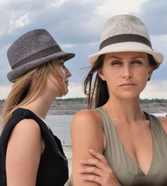 "„Marcello\" is the uncomplicated hat in trilby style for sunny summer holidays. For „Marcello\" the airy, light material „twisted paper\" was used in the colour „nature\". Available in sizes 55 cm - 58 cm. Colour: „natural\" Hat made of twisted paper. Ribbed belt made of 66% cotton and 34% polyamide. Handmade. Individualization options. Other colours or sizes on request. All hats are handmade. For the production of a perfect hat it takes some time. All hats are ready 7-12 days after payment rec Modern Summer Hat With Curved Brim, Modern Spring Hat With Curved Brim, Modern Spring Hats With Curved Brim, Modern Curved Brim Hats For Summer, Modern Curved Brim Hats For Spring, Modern Brimmed Summer Hats, Modern Wide Brim Hat For Spring, Modern Brimmed Panama Hat For Summer, Modern Summer Hat With Short Brim