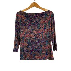 Brand: Talbots Color & Print: Blue With Purple, Aqua, Red And Gold Print. Fabric: Rayon And Spandex. Machine Washable. Sleeves: 3/4. Neckline: Boat Neck. Details: In Excellent Nwt Condition. No Stains Or Flaws. Measurements: Approximately 18" Across The Chest And 23.5" Length. Non-Smoking Home. Spring, Summer, Fall, Winter, Casual, Colorful, Bright, Paisley, Preppy, Dopamine Dress, Soft, Lightweight, Patterned 3/4 Sleeve Tops For Fall, Casual Purple Top With Paisley Print, Casual Purple Paisley Print Top, Multicolor Fitted Tops With 3/4 Sleeves, Fitted Multicolor Tops With 3/4 Sleeve, Neck Details, Gold Print, Color Print, Winter Casual