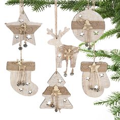 three wooden ornaments hanging from a christmas tree