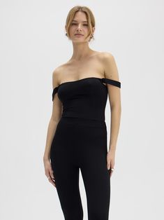 Black bodysuit with gently falling straps. Designed so that it does not slip off the silhouette and fits perfectly with a bardot bra. Incredibly works with any styling. Made from a double layer of fabric, with seamless trims. Beautifully exposes shoulders and cleavage. Elastic threads for comfortable wear. Fastened with nickel-free springs. 94% LENZING ™ MODAL 6% ELASTANE Size Guide: We recommend ordering your usual size. This product fits many different body shapes thanks to the fabric and elasticity. Washing Instructions: When washing in a washing machine, use a delicate program only.Use a gentle cycle with a maximum of 600 rpm.Wash at a maximum temperature of 30°C.Turn garments inside out before washing.Wash only similar colours and light items.Consider using a fabric razor occasi Kids Garments, Elastic Thread, Body Black, Knit Bottom, Shoe Inspiration, Active Wear Leggings, Sweaters Knitwear, Party Looks, Skirted Swimwear