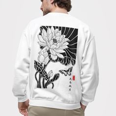 The tattoo inspired lotus sweatshirt features traditional Japanese art, making it a great jersey for Japan lovers. This Harajuku streetwear oversized unisex sweat combines classic design with modern comfort. 𝗗𝗘𝗧𝗔𝗜𝗟𝗦  - Made with a 50% cotton, 50% polyester blend (8.0 oz/yd²) - Comfortable with durable double-needle stitching. - Itch-free; pearlized tear-away label. - Made from 100% ethically grown US cotton - OEKO-TEX-certified dyes for low environmental impact. 𝗖𝗔𝗥𝗘 𝗜𝗡𝗦𝗧𝗥𝗨𝗖𝗧? Traditional Japanese Art, Harajuku Streetwear, Traditional Japanese, Japanese Traditional, Japanese Art, Halloween Shopping, Classic Design, Sweat Shirt, Harajuku