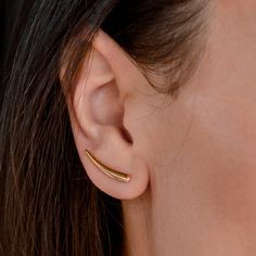 Lovely 24k gold cuff earrings in minimalist style. Look great on the ear, go under any style of clothing. What is Gold Vermeil Gold Vermeil - is genuine .925 sterling silver that has been expertly plated with a thick layer of 14k-24k gold. Advantages Gold Vermeil: * Base of high-quality sterling silver * A thick gold layer of at least 10k * Most of the time 14k-24k gold is used * Industry regulated gold thickness of no less than 2.5 microns (very thick). 24k Gold Plated Ear Climbers - Gold Ear C Gold Ear Climbers For Everyday, Gold Ear Cuff With Matching Earrings For Everyday, Gold Minimalist Ear Climbers, Minimalist Ear Cuff With Matching Earrings For Everyday, Minimalist Ear Cuff With Matching Earrings, Everyday Gold Ear Climbers, Modern Yellow Gold Ear Cuff For Everyday, Modern Gold Ear Climbers For Everyday, Modern Everyday Gold Ear Climbers