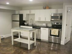 the kitchen is clean and ready for us to use in its new owner's home