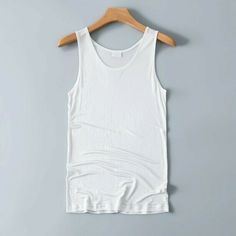 The item is just for one tank top only. not include others accessories. Our size are Asian Size, please check the measurements carefully before making a purchase. We suggest you buy one or two sizes larger. Beside, Please allow 1-3 cm difference due to manual measurement. Men Knitted Silk Vest Tank Top Basic T Shirt Sleeveless Gym Sport Stretch Casual Size: L,XL,2XL L: length 67cm/26.4 in, chest 96cm/37.8 in, hem 96cm/37.8 in XL: length 68cm/26.7 in, chest 102cm/40.1 in, hem 106cm/41.7 in 2XL: l Mens Sleeveless Shirt, Silk Vest, Men's Knit, Cotton Tank Top, Basic T Shirt, Sleeveless Shirt, Casual Button Down Shirts, Casual Tops, Shirts Tops