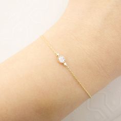 * One rose cut diamond bracelet * Natural rose cut diamond approx. 0.10-0.15ct gh, vs-s * Two natural accent diamonds, 0.02ctw * Solid 14k gold chain adjustable at 6.5" or 7" * Spring ring clasp closure * Ethically sourced solid 14k yellow gold and gemstones * Packaged in a recyclable kraft jewelry box Gold Wedding Bracelet With Single Diamond, Wedding Gold Bracelet With Single Diamond, Gold Bracelet With Single Diamond For Wedding, Anniversary Diamond Bracelet With Rose Cut Diamonds, Fine Jewelry Bracelet With Rose Cut Diamonds, Elegant Gold Diamond Bracelet Gift, White Diamond Bracelet With Diamond Accents As A Gift, Elegant Diamond Gold Bracelet As Gift, Elegant Gold Bracelet With Single Cut Diamonds For Gift