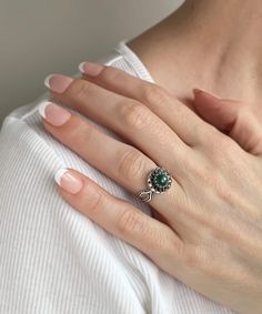 Enhance your feminine style with this exquisite lace dainty flower design 925 Sterling silver ring featuring a stunning malachite gemstone. Whether for daily use or special events like weddings, engagements, or proms, this elegant ring is the perfect accessory to elevate your outfit. Its intricate ornamentation and exceptional craftsmanship make it an ideal gift for holidays, birthdays, and other special occasions, including Christmas and Mother's Day. Crafted with the utmost attention to detail Elegant Turquoise Ring With Center Stone As A Gift, Elegant Turquoise Ring, Elegant Turquoise Ring With Accent Stones, Sterling Silver Emerald Ring For Promise, Elegant Sterling Silver Flower Ring With Birthstone, Elegant Filigree Ring With May Birthstone, Elegant Filigree Ring As May Birthstone Gift, Elegant Flower Shaped Emerald Ring For Gift, Elegant Filigree Ring For May Birthstone Gift