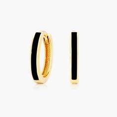 14K Yellow Gold Black Enamel Huggie Hoop Earrings. These earrings exemplify everyday elegance. Wear them every day or save them for a special occasion, the beautiful black enamel is the perfect punctuation for any look. Black Enamel Hoop Earrings For Gift, Black Enamel Hoop Earrings As Gift, Luxury Black Hoop Jewelry, Elegant Black Enamel Earrings, Elegant Enamel Hoop Earrings, Elegant Enamel Hoop Jewelry, Classic Small Hoop Earrings In Black, Classic Small Black Hoop Earrings, Small Black Classic Hoop Earrings