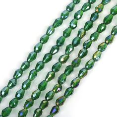 three strands of green glass beads