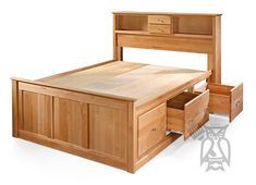 a wooden bed with drawers underneath it and an open drawer on the bottom shelf next to it