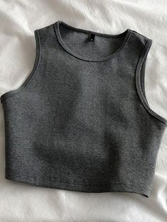 Solid Sleeveless Vest Tank Top, Casual Sleeveless Gray Crop Top, Gray Sleeveless Crop Top For Summer, Casual Gray Sleeveless Crop Top, Gray Tank Vest For Spring, Gray Tank Crop Top For Spring, Gray Sleeveless Spring Vest, Gray Sleeveless Vest For Spring, Retro Crop Top