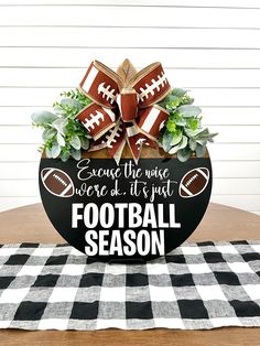 a football themed centerpiece on top of a table