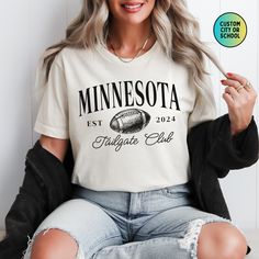 Show off your team spirit in this comfy football-themed crewneck t-shirt! Perfect for game day, tailgating, or everyday wear. This short sleeve, unisex design makes it a great gift for any football fan. PLEASE READ THE DESCRIPTION BELOW FOR ANSWERS TO FAQs PRIOR TO PURCHASE ✔️SHIPPING AND ORDERING INFO: *FREE SHIPPING on all U.S. orders! *Orders typically arrive within 7-10 days after purchase, although many may arrive sooner. *Production times range anywhere from 1-5 business days BEFORE items Collegiate Game Day T-shirt With Team Name, Collegiate T-shirt With University Logo For Game Day, Varsity T-shirt For College Football Season, Game Day University Logo T-shirt, Collegiate T-shirt For Football Season, Sporty Crew Neck Top For Tailgating, College Football Season Team Logo T-shirt, Varsity Football Season Fan Gear T-shirt, Team Spirit Crew Neck Top For Tailgating