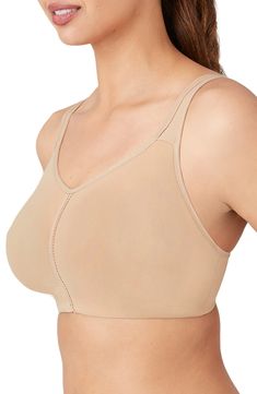 An exceptionally comfortable, seamless wire-free bra features two-ply cups of breathable, moisture-wicking Supplex® fabric that provide a natural-looking lift and light support. Close-set straps in back for a no-slip fit Lined 88% Supplex nylon, 12% spandex; hand wash warm, line dry Imported Supportive Full Coverage Sports Bra With Built-in Bra, Solid Full Coverage Medium Support Bra, Solid Full Coverage Bra With Medium Support, Supportive Seamless Underwire Sports Bra, Supportive Full Cup Bra With Moderate Coverage, Compressive Full Coverage Nursing Bra, Supportive Full Coverage Bra With Medium Bust Support, Full Coverage Sports Bra With Medium Bust Support, Supportive Bra With Moderate Coverage