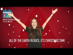 a woman with her hands up in the air and text reading all of the earth rejoice, it's christmas time