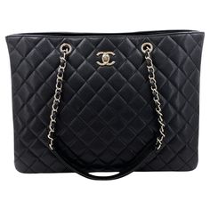 Store item: 68212 A popular recent favorite among Chanel enthusiasts for its versatility and classic Chanel look -- the CC turnlock in the front opens up to a large main compartment and side pockets. Four rounded feet help provide support, and side buttons allow bag to have a sleeker or more broader silhouette. In Black caviar leather and gold hardware. This item is in excellent condition with very few signs of normal use. Corners are clean with no rubbing or scuffing. Hardware is clean and shiny. Interior is clean. Please view all 12 to 16 photos of the actual bag, for details, and ask any questions. Measures 14in. W (at base) x 10.5in. H x 4.5in. D, strap drop is 11 inches Comes with Dust Bag, Authenticity Card For 19 years, Boutique Patina has specialized in sourcing and curating the be Obx Dr, Vintage Chanel Bag, Chanel Suit, Classic Chanel, Hobo Tote Bag, Chanel Brand, Black Caviar, Shopper Tote, Chanel Black