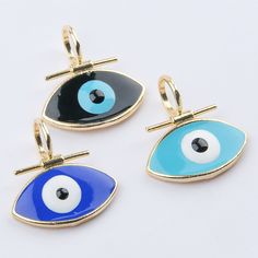 Discover high-quality Evil Eye Pendant jewelry supplies made with 24k gold plating and handcrafting in our shop. Choose from our selection of products including;  Convex Enamel Evil Eye Pendant, Enamel Evil Eye Charms for necklace,  24k Gold Plated Evil Eye Pendant, Evil Eye Pendant Jewelry, DIY Jewelry Making Supplies. ►Features ✔Colored designs ✔Smooth enamel coating ✔Gold-plated ✔Made of brass material. ✔Does not rust and does not tarnish. 📦Free shipping on your purchase of $50 or more. Coupon Code is FREESHIPPING 📌Wholesale Price With new Coupon Codes; %10 off for order over $50. Coupon Code is TUGEZ10 %15 off for order over $100. Coupon Code is TUGEZ15 %20 off for order over $250. Coupon Code is TUGEZ20 ►Jewelry Care Tips❗ ♥️Do not wear jewelry in the pool, spa, or at the beach. ♥️R Gold Enamel Amulet Jewelry, Gold-tone Amulet Jewelry As Gift, Handmade Yellow Gold Enamel Jewelry, Traditional Gold Evil Eye Necklace, Handmade Gold Enamel Necklaces, Gold Evil Eye Amulet Jewelry, Gold Enamel Charm Necklaces, Gold Enamel Charm Necklace, Gold Evil Eye Pendant Jewelry