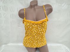 90s Vintage Viscose Womens Yellow Floral Top/Tank Top Ruched. Size S-M. Top in excellent vintage condition. Bust 90cm (35.4 inches), top length 59cm (23 inches). Retro Stretch Summer Tank Top, Retro Stretch Tank Top For Summer, Vintage Stretch Summer Tops, Spring Vintage Stretch Tank Top, Vintage Stretch Tops For Summer, Vintage Stretch Tank Top For Summer, 90s Style Camisole Tops For Summer, 90s Style Summer Camisole Tops, Vintage Spring Camisole Tank Top