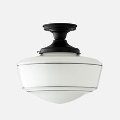 an overhead light fixture on a white background