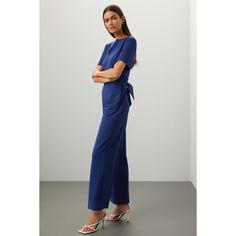 Blue ponte (69% Viscose, 27% Polyamide, 4% Elastane). Jumpsuit. Short sleeves. Split neck. Back zipper closure. 56.6" from shoulder to hemline. 29" inseam. 10" rise. Imported. Formal Full-length Jumpsuits And Rompers For Spring, Full Length Formal Jumpsuits And Rompers For Spring, Formal Fitted Full-length Jumpsuit/romper, Blue Elastane Jumpsuits And Rompers, Formal Fitted Overall Jumpsuits And Rompers, Formal Fitted Jumpsuits And Rompers Overall, Fitted Formal Jumpsuits And Rompers For Spring, Formal Full Length Jumpsuits And Rompers, Elegant Formal Jumpsuits And Rompers