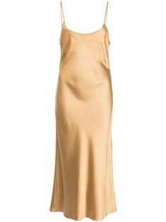 metallic silk midi slip dress from VOZ featuring gold-tone, silk, metallic finish, scoop neck, open back, spaghetti straps, straight hem and mid-length. POSITIVELY CONSCIOUS: We've partnered with Good On You — an ethical agency that rates how sustainably brands perform across various people, planet and animal welfare criteria. This product comes from a Conscious brand that performs well in relation to their impact on people, which ensures good working conditions in the supply chain.. | Voz Metal Gold Chic Slip Dress With Spaghetti Straps, Chic Gold Slip Dress With Spaghetti Straps, Gold Midi Length Slip Dress For Evening, Gold Satin Slip Dress For Night Out, Gold Sleeveless Silk Slip Dress, Chic Gold Midi Slip Dress, Gold Sleeveless Silk Midi Dress, Gold Silk Sleeveless Midi Dress, Gold Sleeveless Satin Midi Dress