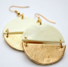 two tone gold and white circular earrings with brass earwires on a white background