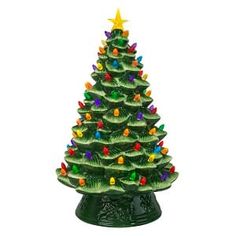 a ceramic christmas tree with multi - colored lights