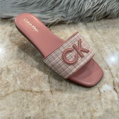 Details & Care An Embossed Logo Accent Stands Out At The Vamp Of A Stylish Slide Sandal Fashioned With A Square Toe For Modern Appeal. Textile And Synthetic Upper/Synthetic Lining And Sole Imported Item #10121824 Brand New Never Worn Same Day Shipping