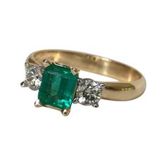 Colombian Emerald Diamond Three-Stone Engagement Ring 18 Karat | See more rare vintage Engagement Rings at https://www.1stdibs.com/jewelry/rings/engagement-rings Three Stone Ring Settings, Emerald Ring Vintage, Contemporary Engagement Rings, Emerald Ring Gold, White Gold Diamond Engagement Ring, Modern Engagement Rings, Diamond Jewelry Designs, Colombian Emeralds, Three Stone Engagement