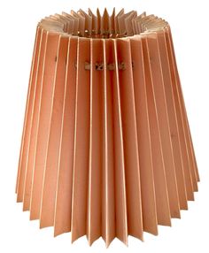 a close up of a lamp shade made out of folded brown paper on a white background