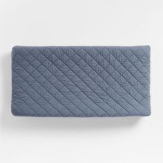 an image of a blue quilted blanket